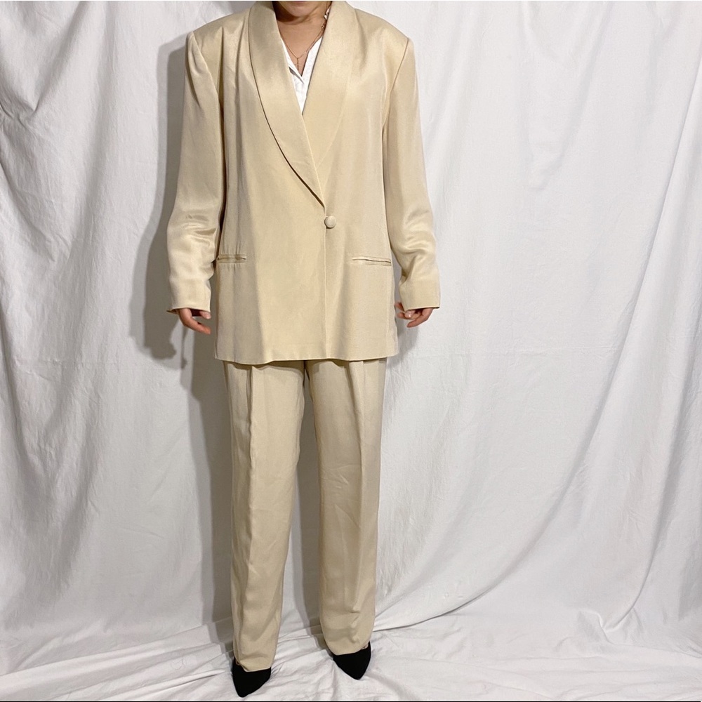 Creamy color and silky suit. Size 12